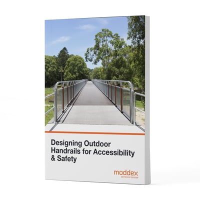 Designing outdoor handrails for accessibility and safety whitepaper cover, featuring compliant handrails on an outdoor pedestrian bridge.